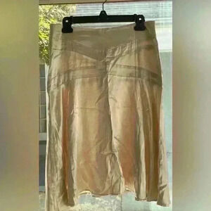 Just In Time women’s champagne colored satiny, fit and flare skirt; size M